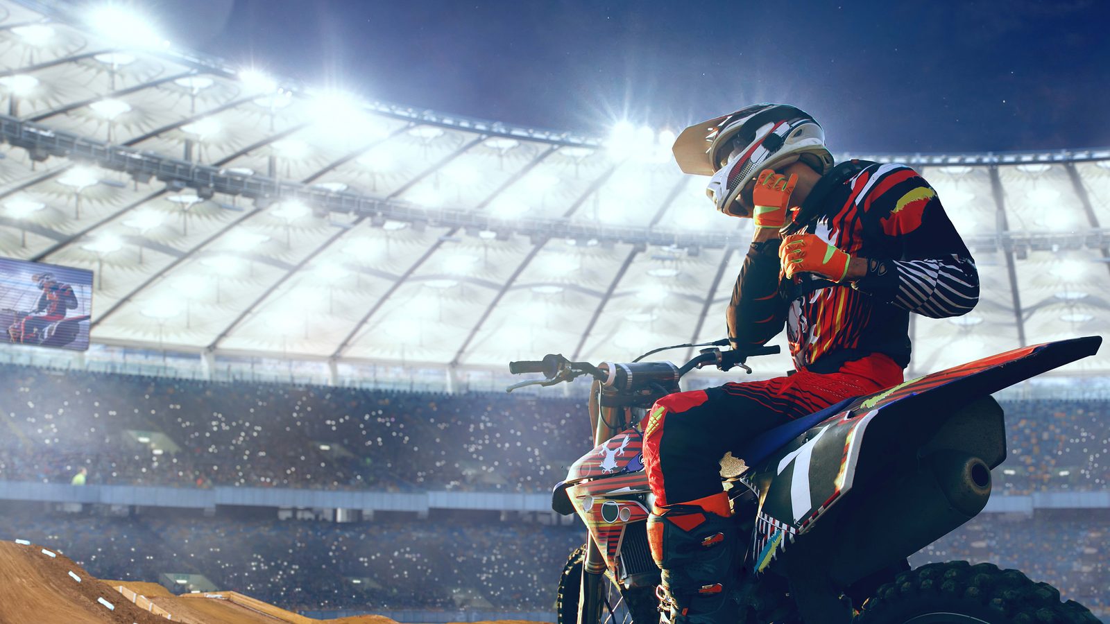 Pilote de motocross en action, bras tendus sur le guidon dans une courbe en terre
